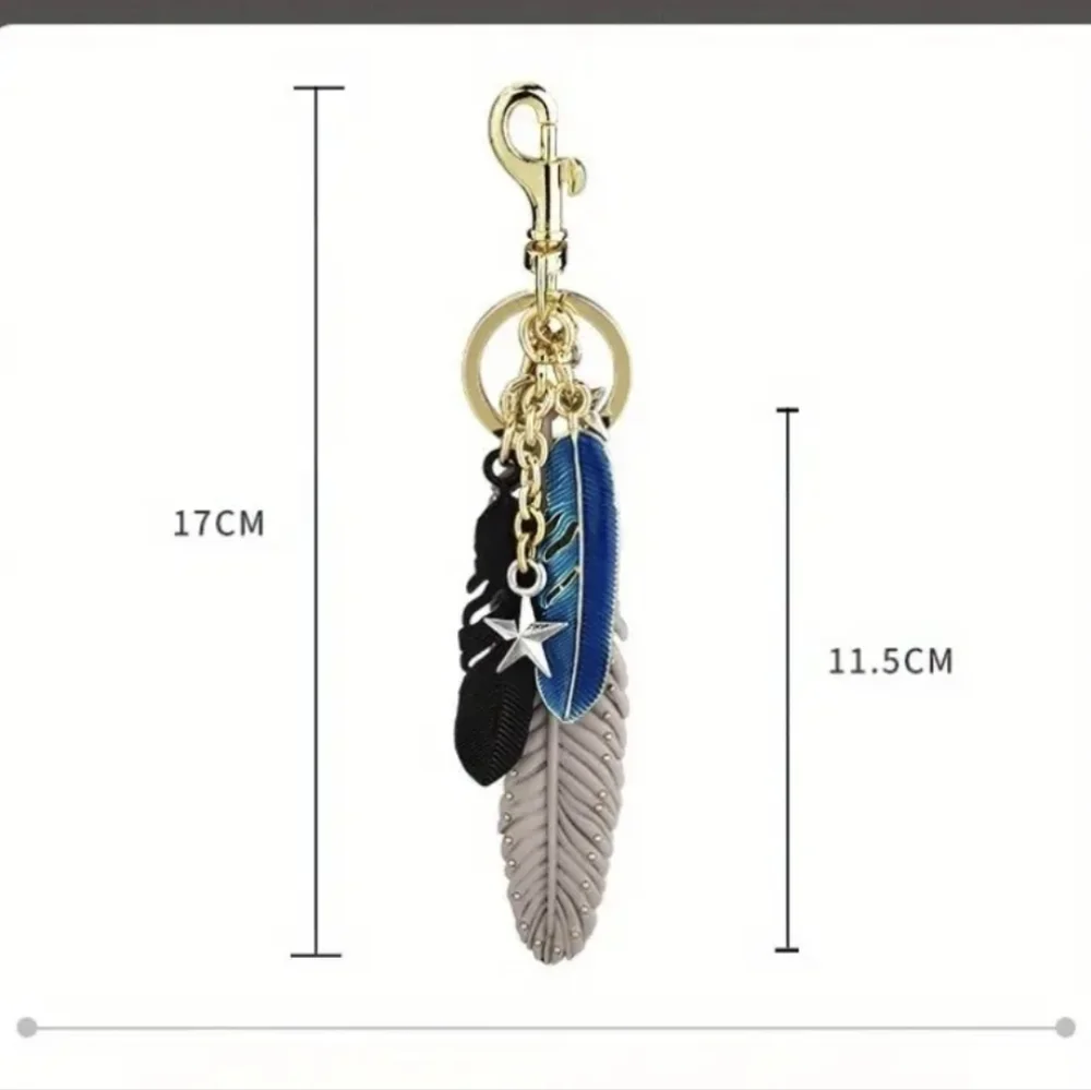 Feather Bag Charm/ Keychain New. 2 Opt, Price Is For 1 Bag Charm
